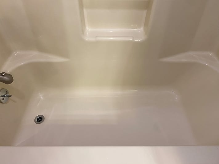 after before cleaning bathtub 